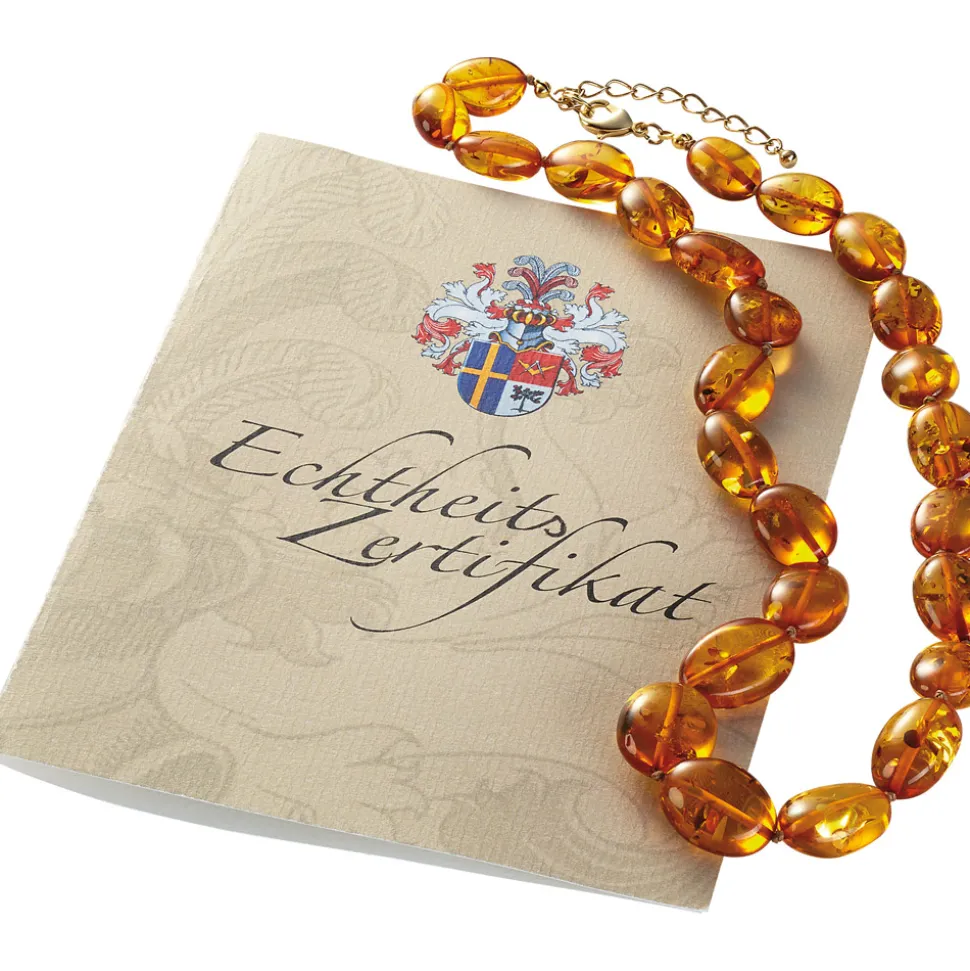 Faszinierend: orange-leuchtender Schmuck aus fossilem Harz