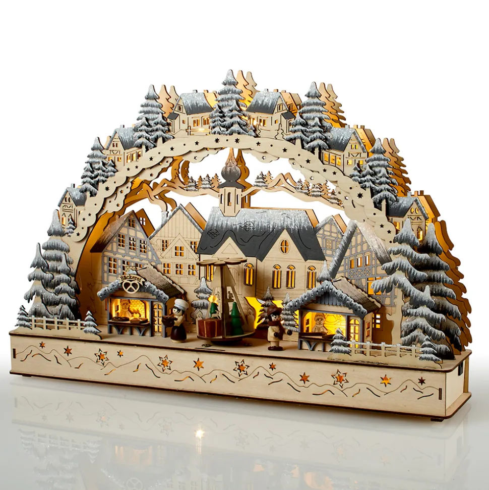 Winterlicher Weihnachtsmarkt mit drehender Pyramide
